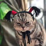 Cat wearing a Halloween Nezha headband with pigtails, perfect for festive pet costume accessories.
