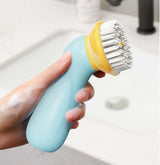 Handheld pet bath brush with ergonomic grip, designed for easy grooming and deep cleaning of dogs and cats.